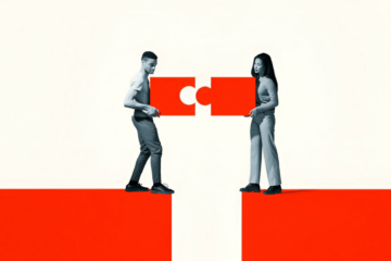 man and woman putting together a puzzle piece