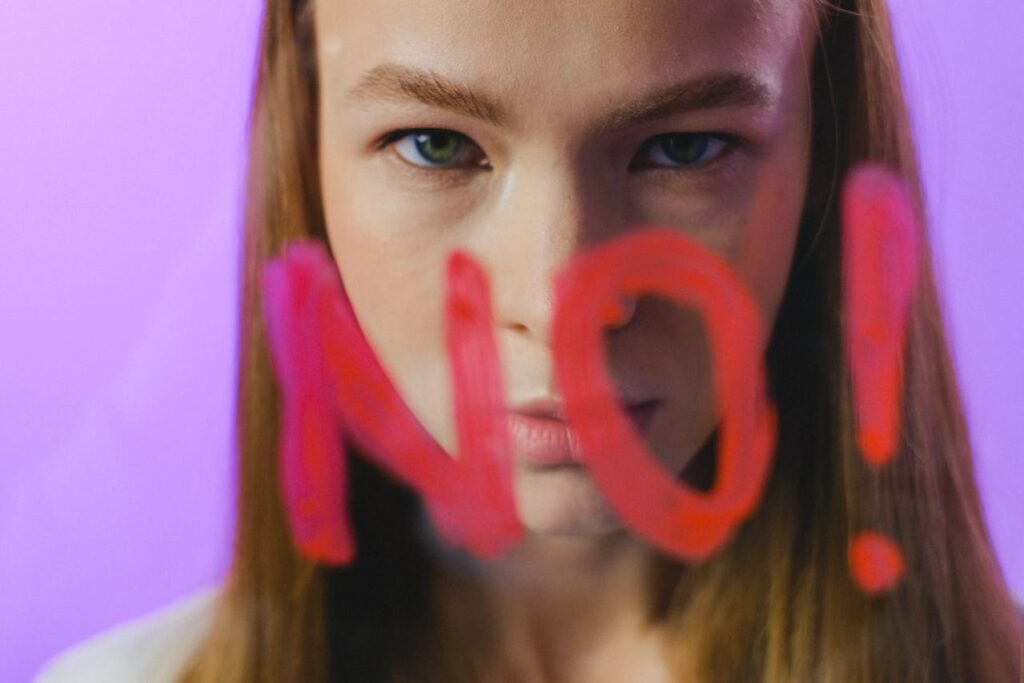 a woman with word no in front